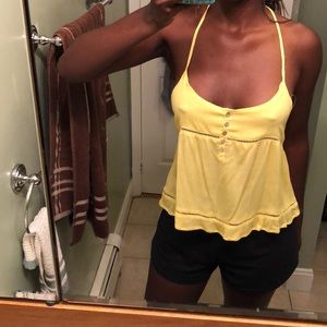 A dark/bright colored yellow shirt